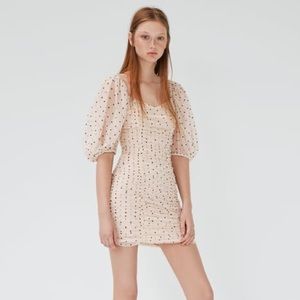 Polka dot draped tulle dress